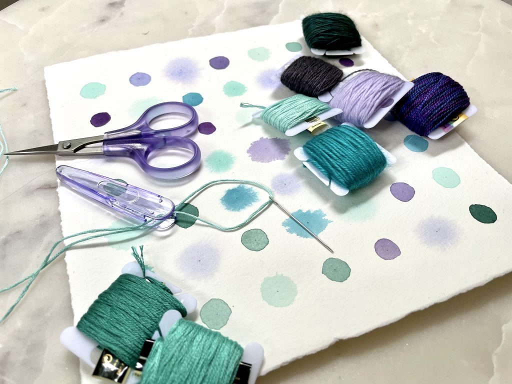 Watercolor dots art and embroidery thread